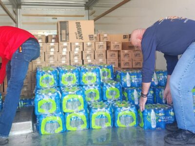 Volunteers Unload A Truck With Water For Residents Of New Palestine, OH On Feb 18, 2023